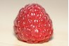 A raspberry is a delicate, delicious fruit.