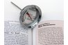 Measure the temperature of the steak with a meat thermometer.