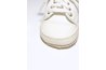 Cover a pair of white sneakers with custom art.