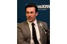 Jon Hamm's side part keeps his hair off of his face, even between cuts.