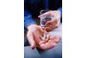 Man holding pain medication
