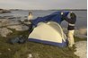 Couple camping by the beach