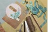 Scissors cut cardboard cards and decorations.