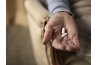 Person holding pills