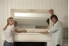 A large mirror creates the illusion of an extra window.