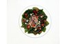Spinach is softer in texture than kale and lends itself better to salads than its counterpart.