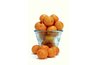 Use various setups or dishes for stacking whole oranges to serve.