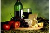 Create a serving tray for a wine and cheese party.