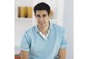 Dress up a polo shirt with a stylish watch or belt for a casual birthday party look.