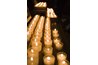 Candles placed in glasses prevent wax burns.
