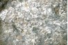 Mica is a shiny silicate mineral found in granite or crystal.