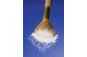 Powder soaks up excess moisture from a Biro ink stain.