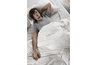 Man laying in bed