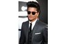 Bruno Mars adds a vintage touch to his look with a pompadour.