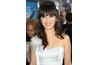 Zooey Deschanel pairs her headband with loose waves.