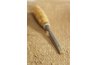 Use a flat chisel to add finishing touches to your sculpture.