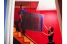 High-intensity walls need strong colored accessories to maintain balance.