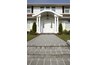 Columns and an arched roof give a traditional, slightly formal feeling.