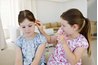 Rewards given when a child shares are a form of positive reinforcement.