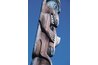 This is a carved and painted wood totem.