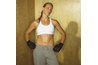 Bind your bosom with a tight-fitting sports bra.
