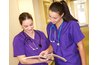 Nurses looking at paperwork