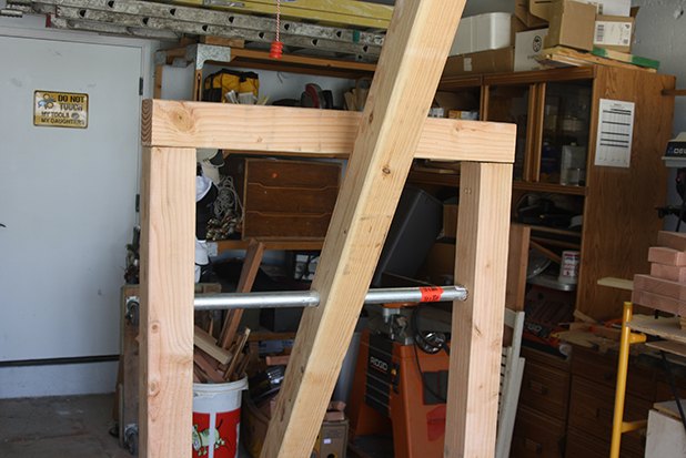 4x4 header is attached with four screws on each side.