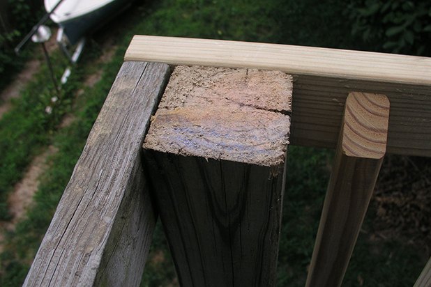 Remove a baluster if necessary for placement.