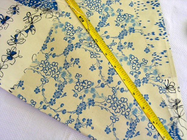 Sew through to front and reattach to backside.