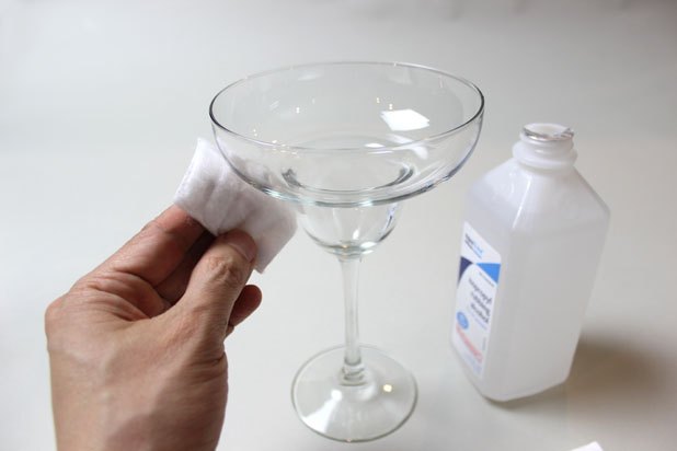 Clean the glass with rubbing alcohol