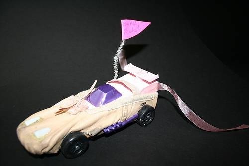 Girl Scout powder puff derby car with a ballet slipper