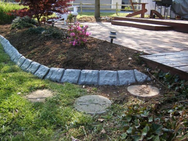 Lawn edging with a stone border Lawn edging with a stone border