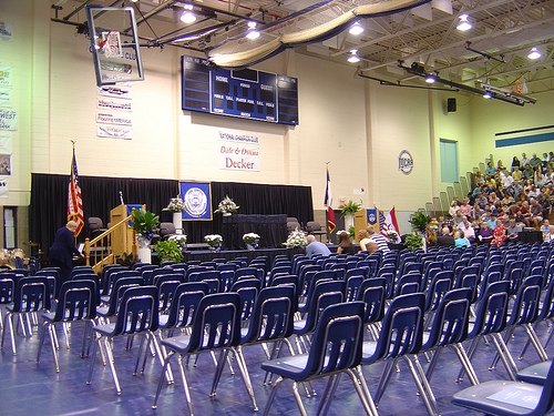 High school graduation in the gym.