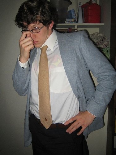 Dressed as Clark Kent with a suit