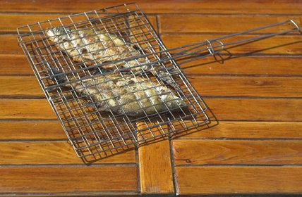 Yellowtail can be placed directly on the grill or on a wooden plank.