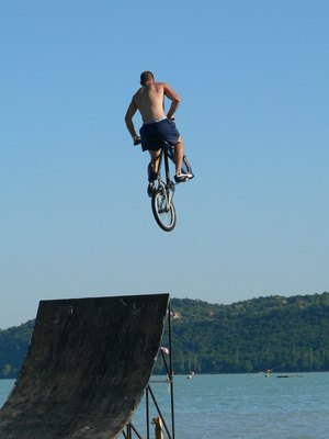 Flying from a motor-bike into water take guts and skill. Flying from a motor-bike into water take guts and skill.