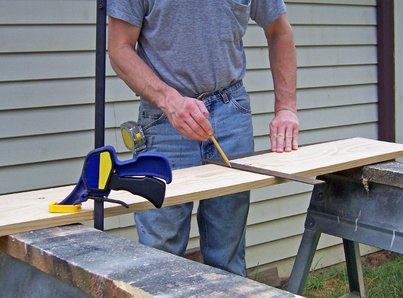 If a circular saw is not available, a hand saw can be used to cut the board.