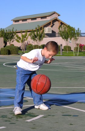 Make sure a child knows to dribble with one hand at a time.