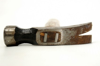 Use a hammer or cat's paw to remove nails.