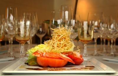 Lobster salad with heirloom tomatoes, crispy shoe-string potatoes and aged balsamic vinegar