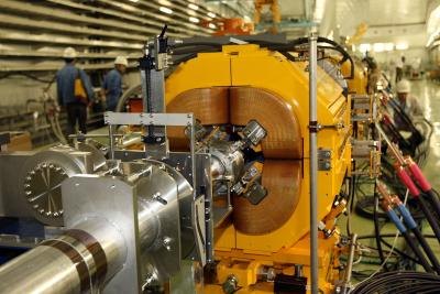 Men working with a Proton Synchrotron.