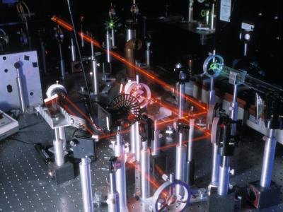 Laser beams reflecting off of different surfaces on factory tool. Laser beams reflecting off of different surfaces on factory tool.