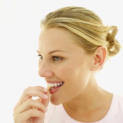 Adding calorie-dense foods like nuts will help you gain weight. Adding calorie-dense foods like nuts will help you gain weight.