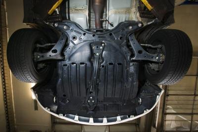 Underside of a car on a lift