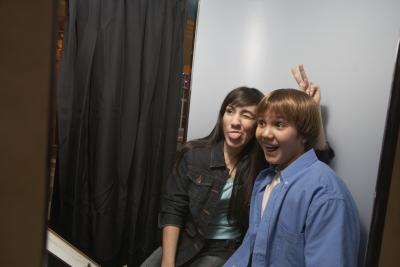 Rent a photo booth for a wedding reception activity.
