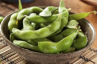 Small bowl of steamed edamame.