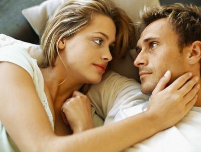 Couple lying in bed