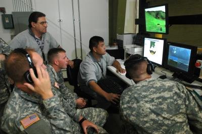 Instructors train military personal on Stryker vehicles