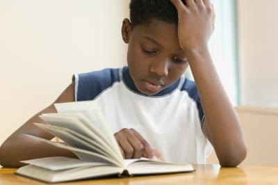 Boy reading book