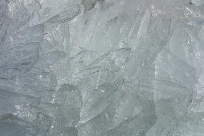 Salt works to depress the freezing point of water.